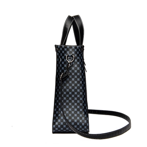 Minimalist navy blue patterned tote bag with adjustable shoulder straps on white background