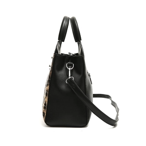 Large black leather tote bag with stylish animal print panels and dual top handles