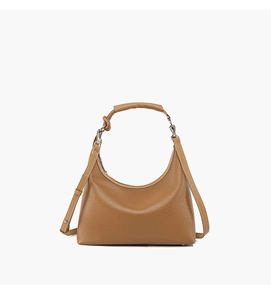 Detail of caramel leather hobo bag with pebble texture and adjustable shoulder strap