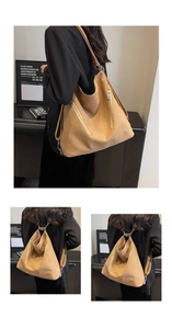 Detail of khaki canvas bag showing adjustable straps and dual vertical zipper pockets
