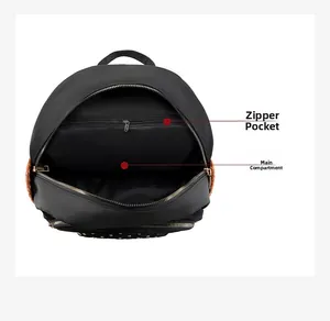 Detail view of the spacious main compartment and hidden zipper pocket of the black backpack