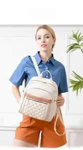 Fashionable cream white quilted backpack with gold studs and glitter strap details