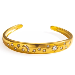 Bracelet jonc ajustable en acier plaqué or 18k avec motifs lune, soleil et étoiles