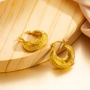 Golden 18K PVD plated titanium steel hoop earrings with hammered metal texture design