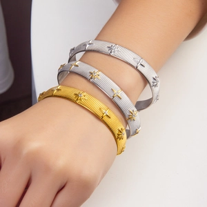 Three-piece stackable hexagram brushed bangles in gold and silver with PVD 18k plating