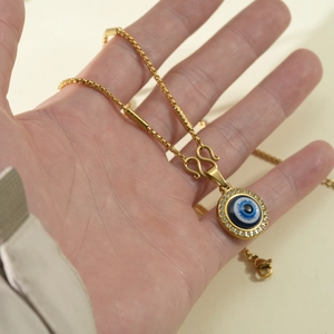 Collier avec pendentif œil maléfique en acier inoxydable plaqué or 18K et zircons