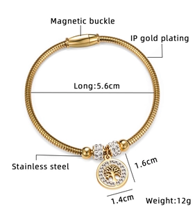Detail of 18K gold stainless steel tree of life charm with magnetic closure and sizing