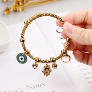 18K gold plated stainless steel Hamsa Hand and Evil Eye charm bracelet for women