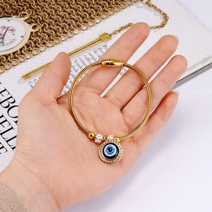18K gold plated stainless steel snake chain bracelet with evil eye zircon pendant on hand