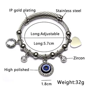 Adjustable wire bracelet with blue evil eye pendant and zircon heart detail, 5.7cm size