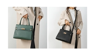 Detail of elegant crocodile-embossed leather handbags with gold lock and shoulder strap