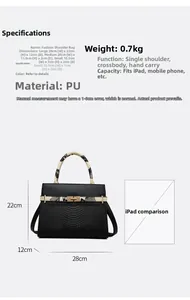 Detail view of black PU leather handbag with snakeskin pattern straps and size comparison