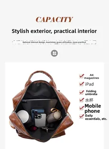 Detail view of the brown leather backpack interior showing digital compartment and storage space