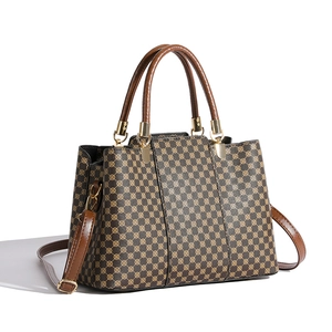 Borsa a mano vintage da donna con motivi geometrici e manici in pelle marrone
