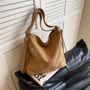 Versatile khaki canvas tote bag with large capacity and multi-pocket design for daily use