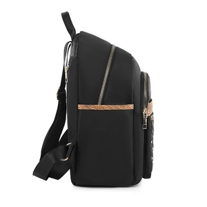 Women's black oxford fabric backpack with gold zippers and snake pattern side detail