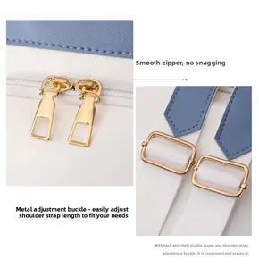Detail view of smooth double gold zippers and adjustable buckles on a bicolor backpack