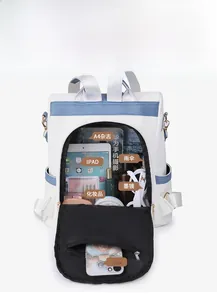Interior view showing large capacity and organized compartments for a laptop and daily essentials