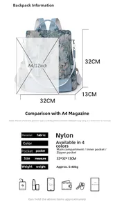 Detailed view of light blue nylon backpack dimensions 32x32x13cm with floral pattern