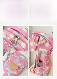 Detail view of pink nylon backpack showing sturdy dual zippers and side water bottle mesh pocket