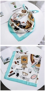 Detail of square silk scarf with cartoon cat, coffee motifs and French vintage patterns