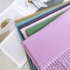 Thick two-sided scarf for women with soft tassels in multiple pastel color options