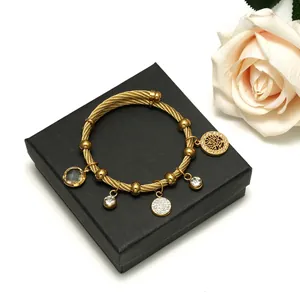 18K gold plated stainless steel cable bracelet with Tree of Life and zircon charms