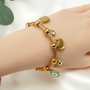 Goldenes Edelstahl-Armband mit Evil-Eye Herz- und Schlossanhängern für Damen