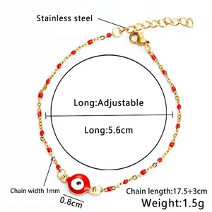 Dettaglio del bracciale in acciaio inossidabile placcato oro 18K con occhio greco rosso
