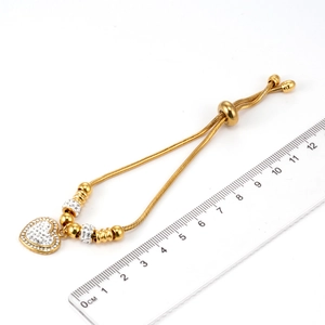 Bracciale a catena serpente in oro 18K con ciondolo a cuore, cristalli e chiusura regolabile