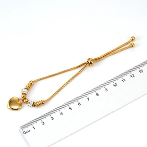 Adjustable 18K gold-plated stainless steel snake chain bracelet with crystal heart pendant