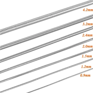 Stainless steel snake chains in seven thickness sizes from 0.9mm to 4.2mm on white background