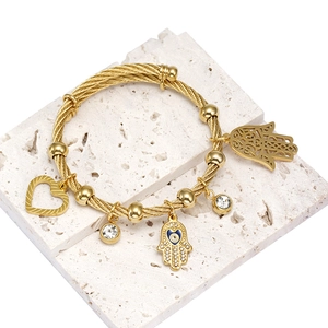 Bracciale a cavo dorato con ciondoli Mano di Fatima e Occhio di Allah su pietra