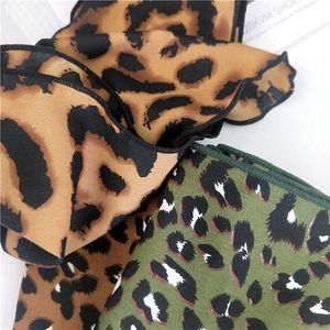 Leopard print triangular silk scarves in classic brown and green chiffon with rolled edges