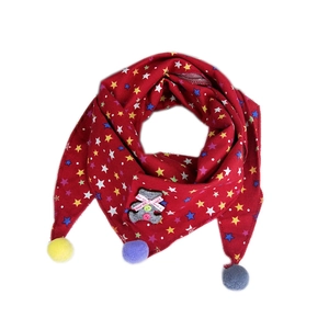 Red triangular baby scarf with colorful stars, plush bear patch and pom-pom details