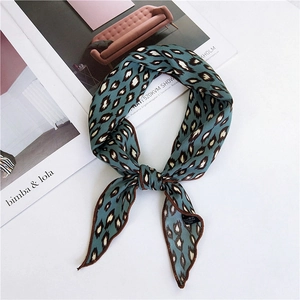 Blue leopard print skinny silk scarf for women made of elegant polyester fabric