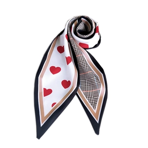 Twilly silk scarf featuring red heart patterns and classic black white houndstooth design