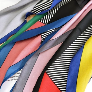 Silk feel neck scarf with geometric patterns and striped colorblock patchwork design