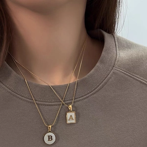 18K gold-plated stainless steel shell necklaces with initial A and B pendants