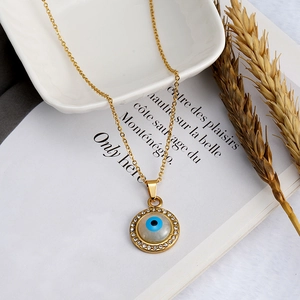 Collana in acciaio inossidabile placcato oro 18K con ciondolo Evil Eye e mini cristalli