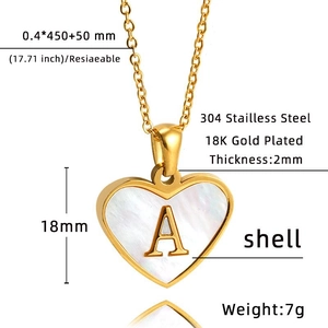 Detail showing 18k gold plated heart necklace dimensions and shell inlay pendant specs