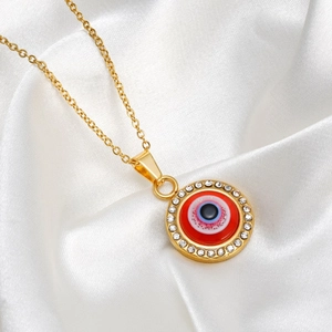Collier en acier inoxydable doré avec pendentif Œil bleu et strass scintillants