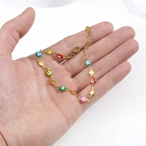 Colorful evil eye bracelet with gold heart charms in polished 18K plated stainless steel