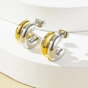 Minimalist two-tone chunky hoop earrings in gold and silver stainless steel design