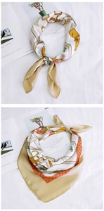 Close-up of equestrian print silk scarf with bridle patterns and polka dots detail