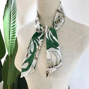 Floral print chiffon twilly scarf for bags and hair styling shown on mannequin