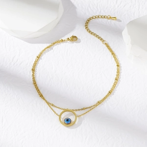 Golden double-layered stainless steel anklet featuring a blue Evil Eye circular pendant