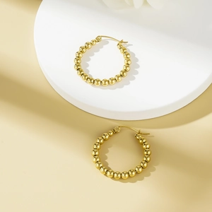 Elegant gold beaded hoop earrings in vintage style with polished stainless steel finish