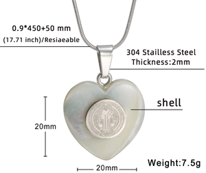 Religious heart pendant with St. Benedict medal and white shell on a snake chain
