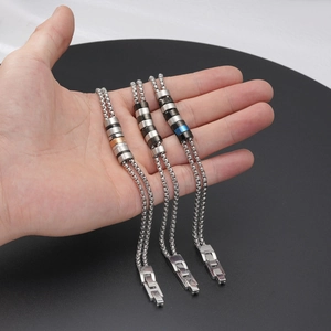 Men's double layer stainless steel Cuban chain bracelet with metallic beads and pearl accents